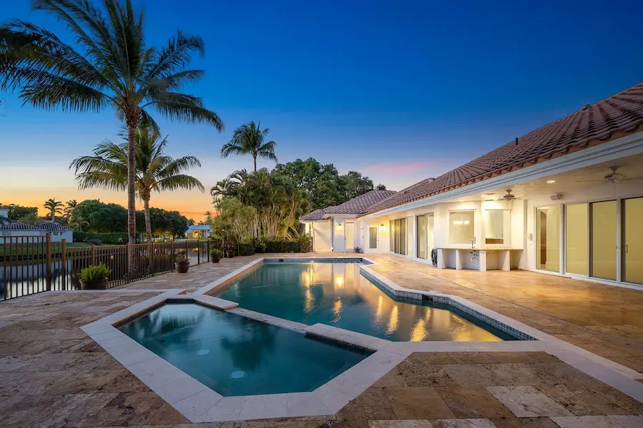 Backyard pool at dusk